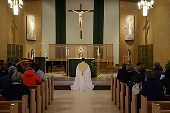 Fr Dan Ponisciak, C.S.C., leads Adoration