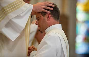 Bishop Jenky with Father David Halm, CSC
