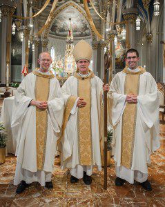 Two priests and the bishop