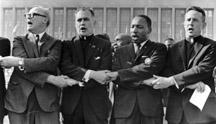 Father Hesburgh stands with Martin Luther King Jr. and others in Chicago, 1964