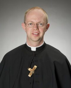 Rev. Mr. Adam Booth, C.S.C.