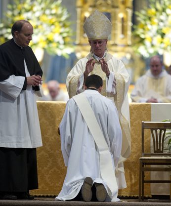 Bishop Kevin C Rhoades, DD laying on of hands