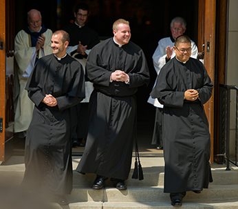 Mark DeMott, CSC, Jarrod Waugh, CSC and Brian Ching, CSC after professing Final Vows