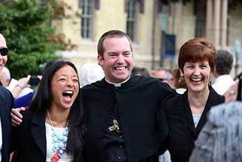 Deacon Tim Mouton, CSC with friends and family
