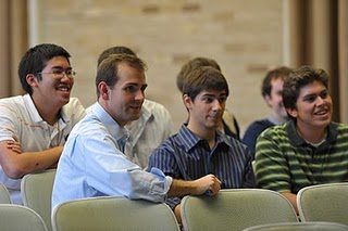 Dennis with fellow seminarians playing trivia