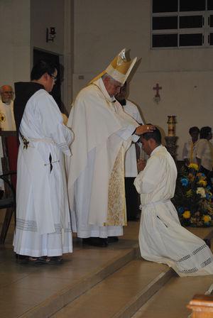 Archbishop Rogelio Cabrera Lopez of Monterrey pffers the Sacrament of Holy Orders to Jorge Armando Morales Trejo in the US Province Region of Mexico