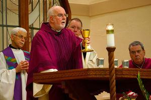Father O'Hara elevates the chalice at the 30th anniversary Mass at TriCommunity in Colorado Springs
