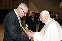 John Cavadini presents Pope Benedict XVI with a festschrift from the University of Notre Dame