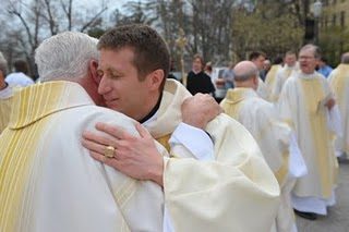 Fr Charlie after his Ordination embracing now Superior General, Fr