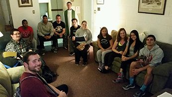 Fr Chase Pepper, CSC, with students
