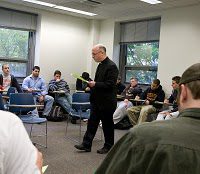 Fr Dan Issing, CSC teaching at King's college