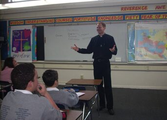Fr Greg Haake, CSC teaching