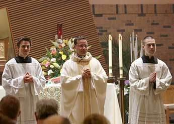 Fr David Halm, CSC during the presentation of gifts