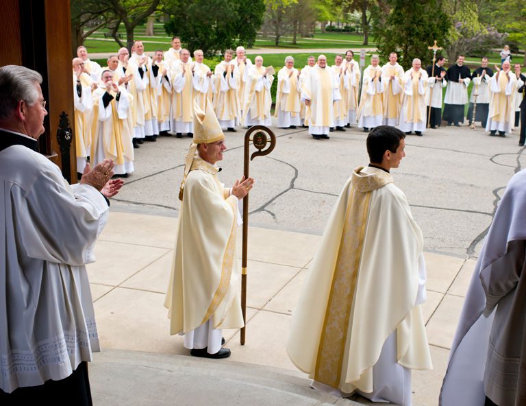 Fr Matt Kuczora, CSC exiting the Basilica