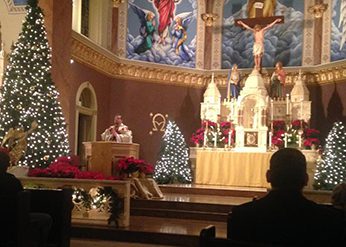 Fr Waugh, CSC offers mass at his home parish in Kansas