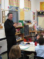 Fr John DeRiso, CSC at St Joseph grade school