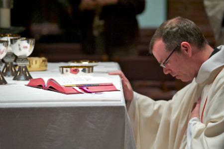 Father Thomas Looney presiding at Mass