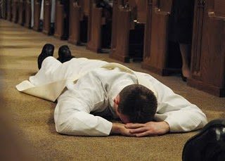 Lying prostrate during the Litany of Saints
