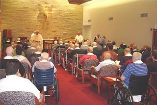 Men of Holy Cross House at mass