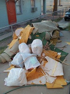 Old carpeting removed from Andre House