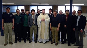 Old Collegians with newly ordained Fr