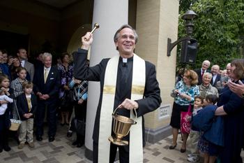 Rev. John I. Jenkins, C.S.C., blesses Carole Sandner Hall