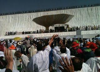 The Holy Father waves to the priests and crowd following mass