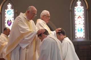 Laying on of hands by the Presbyterate