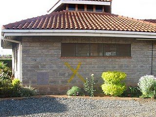 Yellow X on the Chapel wall