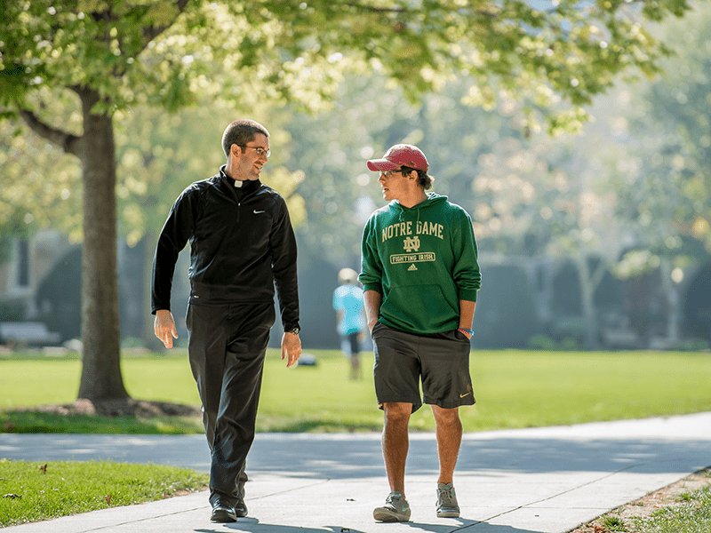 Young Priest mentoring a Young Man