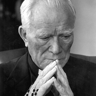Venerable Patrick Peyton, C.S.C. with a rosary