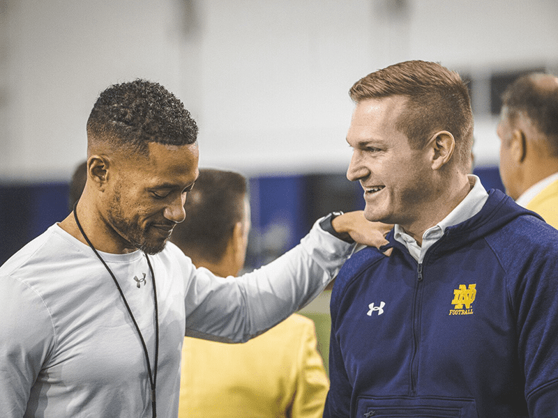 Fr. Nate Wills with Notre Dame football team