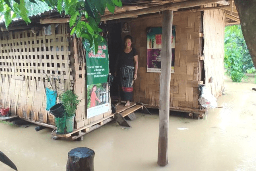 Women standing in flooded house