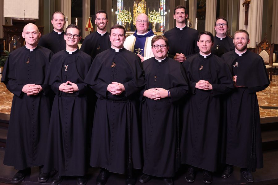 Ten Holy Cross Men Profess Final Vows