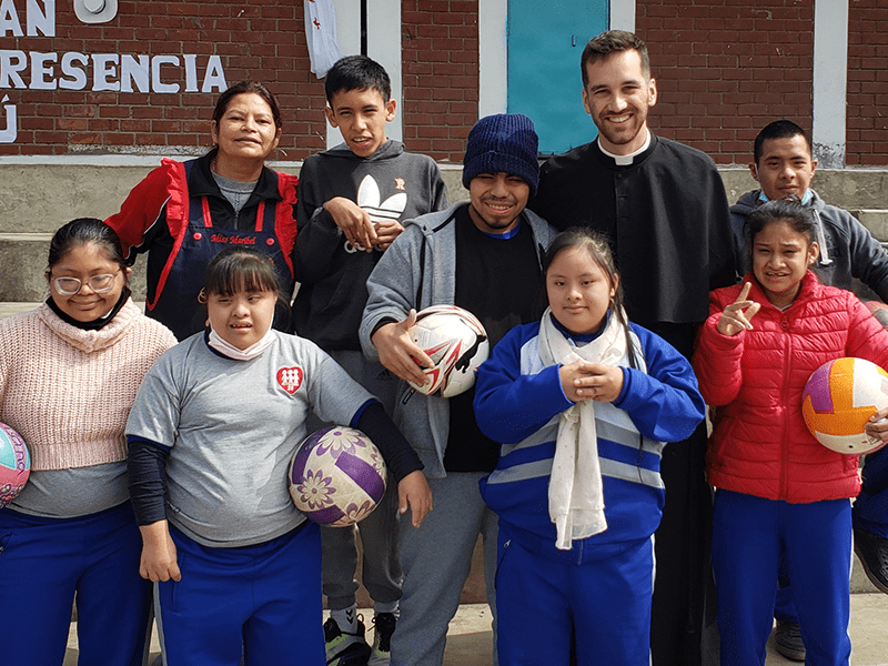 Steve Jakubowski with children in Chile-Peru