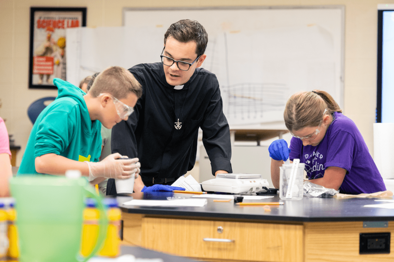 Deacon Brian Vetter teaching students at STEM camp