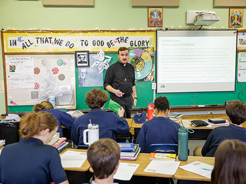 Holy Cross Priest teaching