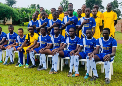 soccer players with hand over heart