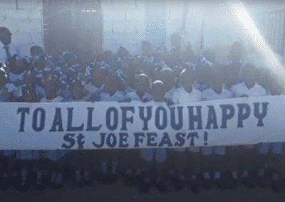 school children with banner