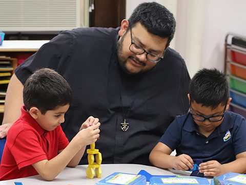 Holy Cross Priest teaching