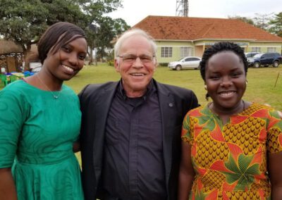 Rev. Wilfred (Willy) Raymond, C.S.C, with HCFM Staff in Uganda (more info in details)