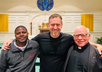 Fr. Wilfred (Willy) Raymond, C.S.C., (Right), Chris Stephanic (Centre) and Br. Adolf Mugume, C.S.C., (Left)