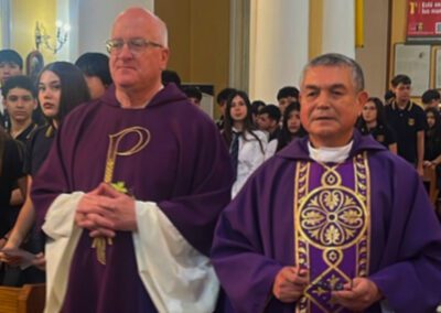 Fr. Bill Lies, C.S.C., processing at the beginning of Mass during a March 2026 visit to Chile-Peru,