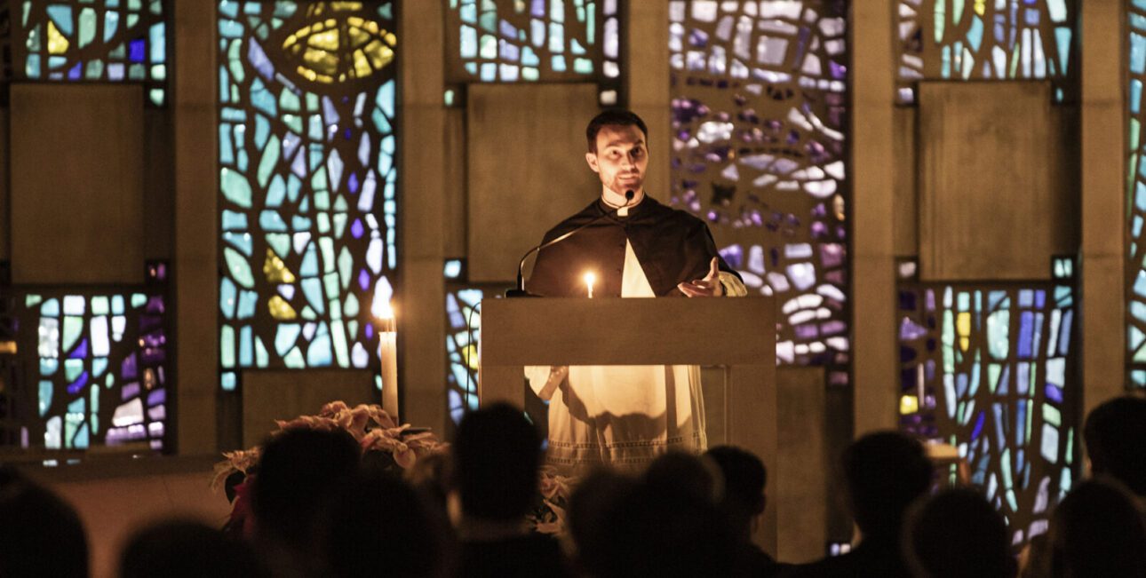 Seminarian Eric Washkewicz gives a homily at a 2026 Lucernarium celebration at Moreau Seminary and Scholasticate.