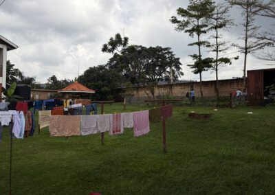 Postulants gardening and hangdrying laundry at St. Andre Bessette Postulant Formation House in Bugemebe, Jinja, Uganda