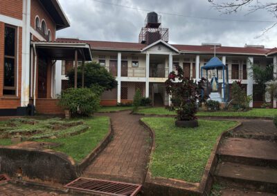 Residences, chapel, and Mater Purissima statue at St. Andre Bessette Postulant Formation House in Bugembe, Jinja, Uganda