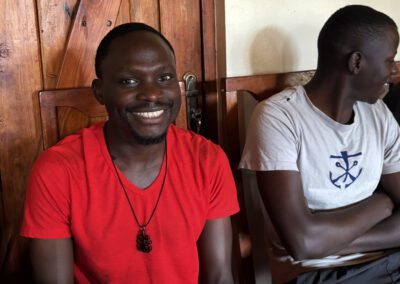 Two men in formation enjoying conversation at St. Andre Bessette Postulate Formation House