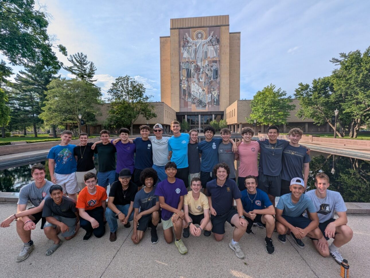 SSIP Participants huddle on the football field at the University of Notre Dame