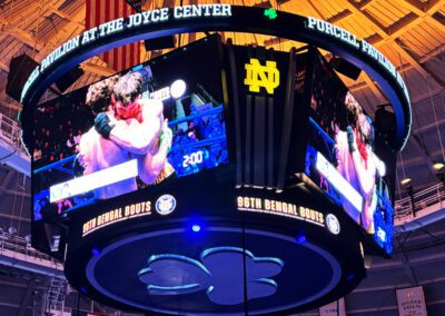 Large digital sign suspended above the boxing ring at the 2026 Bengal Bouts competition.