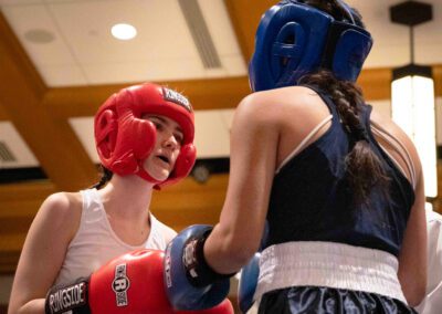 Two University of Notre Dame female boxers sparring.